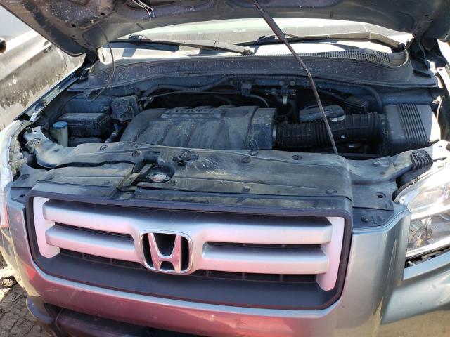 Photo 12 from auction – 2006 HONDA PILOT EX with VIN 2HKYF18486H535247
