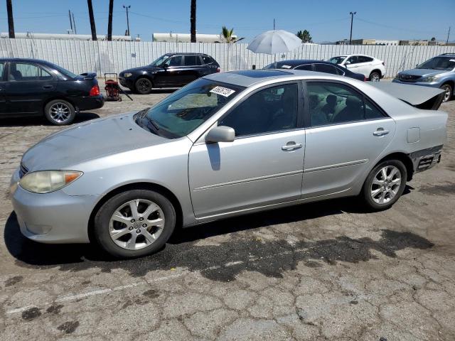 TOYOTA CAMRY LE 2005 with VIN 4T1BF30K25U604963 - Photo from auction