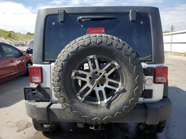 Photo 6 from auction – 2011 JEEP WRANGLER U with VIN 1J4BA3H18BL614293