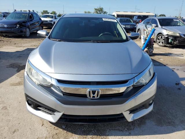 Photo 5 from auction – 2016 HONDA CIVIC EX with VIN 19XFC1F35GE011635