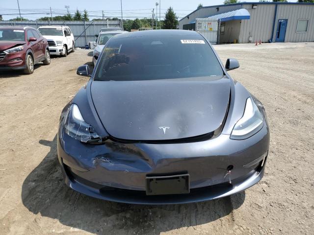 Photo 5 from auction – 2021 TESLA MODEL 3 with VIN 5YJ3E1EA9MF992040