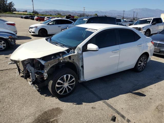 TOYOTA COROLLA L 2015 with VIN 5YFBURHE9FP300801 - Photo from auction