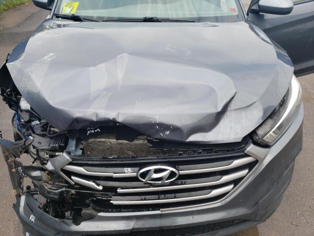 Photo 12 from auction – 2018 HYUNDAI TUCSON SE with VIN KM8J2CA48JU753766