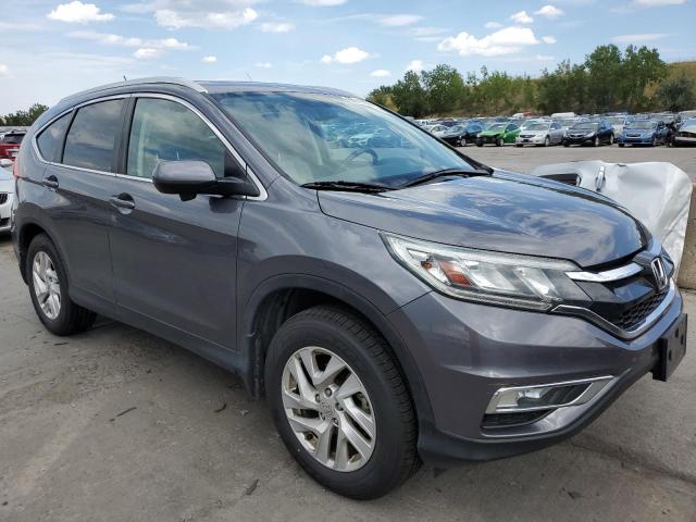 Photo 4 from auction – 2015 HONDA CR-V EXL with VIN 2HKRM4H79FH697801