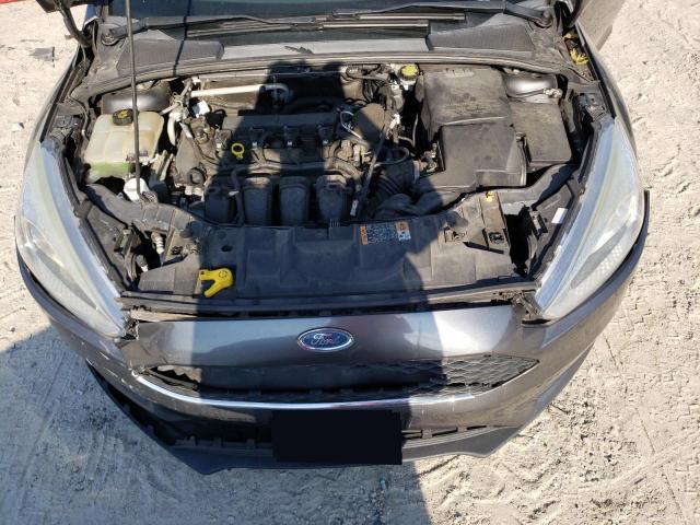Photo 11 from auction – 2015 FORD FOCUS SE with VIN 1FADP3F25FL316613