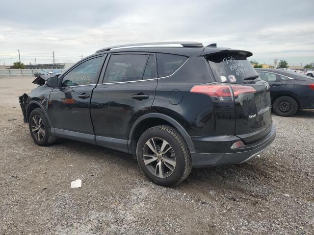 Photo 2 from auction – 2017 TOYOTA RAV4 XLE with VIN 2T3WFREV1HW376974