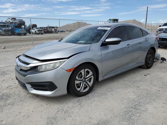 HONDA CIVIC LX 2018 with VIN 19XFC2F56JE017832 - Photo from auction