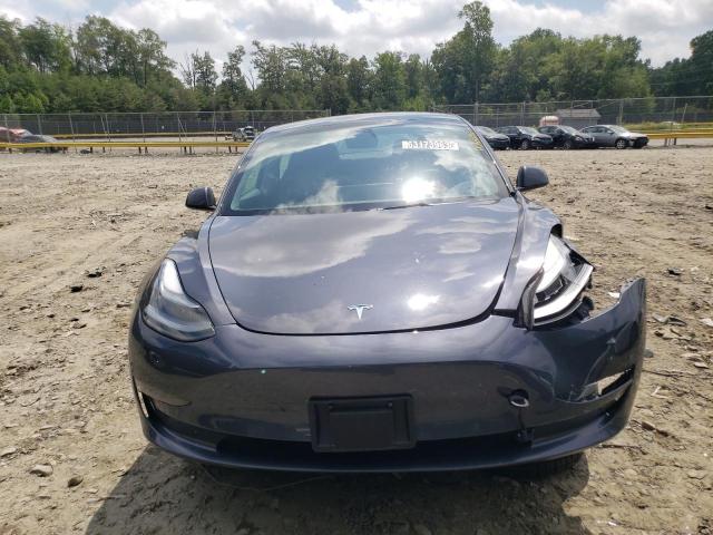 Photo 5 from auction – 2021 TESLA MODEL 3 with VIN 5YJ3E1EA7MF089028