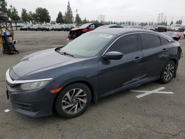 HONDA CIVIC EX 2018 with VIN 2HGFC2F75JH525359 - Photo from auction