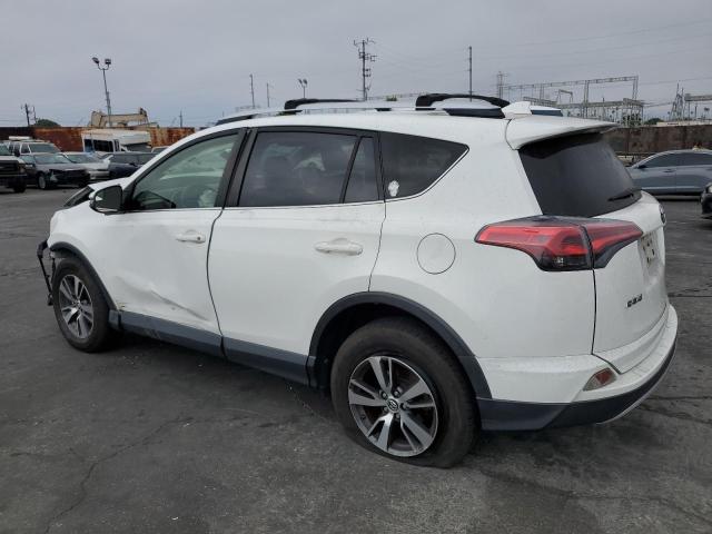 Photo 2 from auction – 2016 TOYOTA RAV4 XLE with VIN JTMWFREV4GJ061180