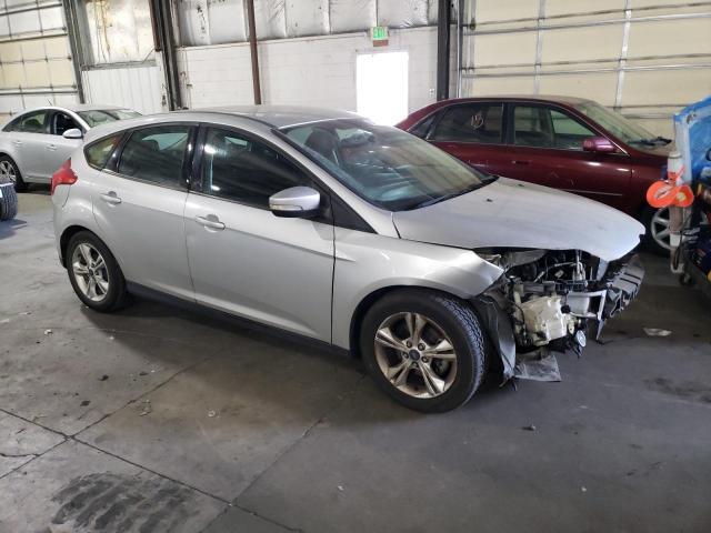 Снимка 4 от търг – 2014 FORD FOCUS SE с VIN 1FADP3K21EL248329