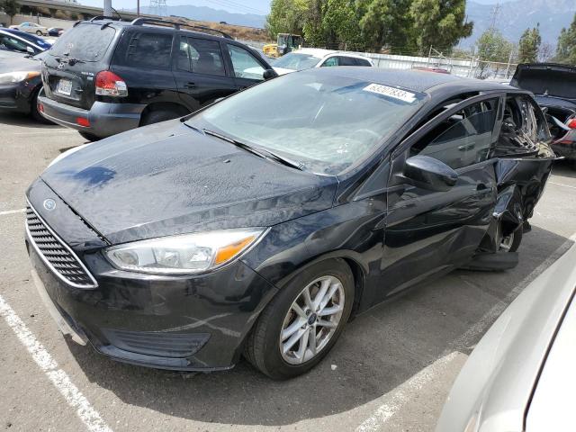FORD FOCUS SE 2018 with VIN 1FADP3F20JL205542 - Photo from auction