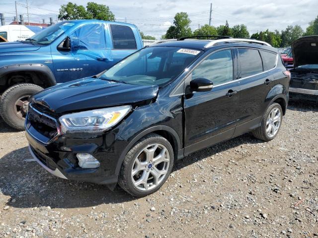 FORD ESCAPE TIT 2017 with VIN 1FMCU9JD1HUA56617 - Photo from auction