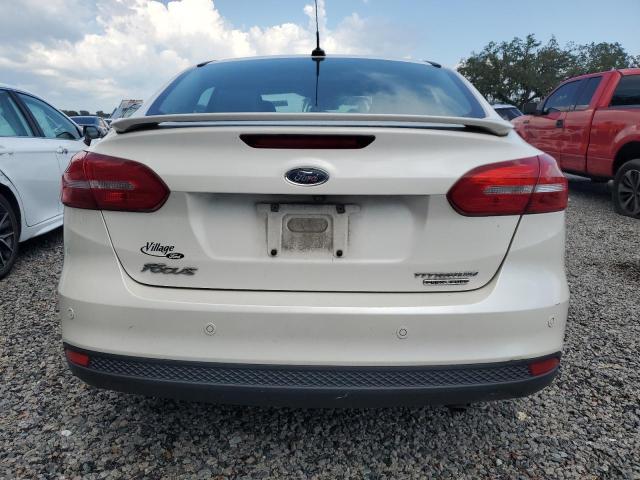 Photo 6 from auction – 2016 FORD FOCUS TITA with VIN 1FADP3J23GL228815