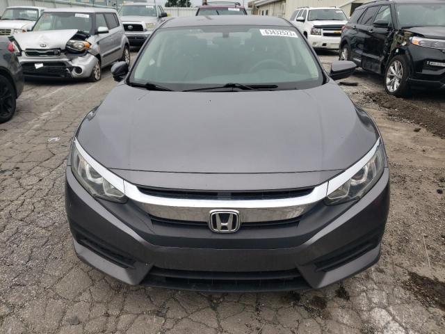 Photo 5 from auction – 2018 HONDA CIVIC LX with VIN 19XFC2F56JE037112