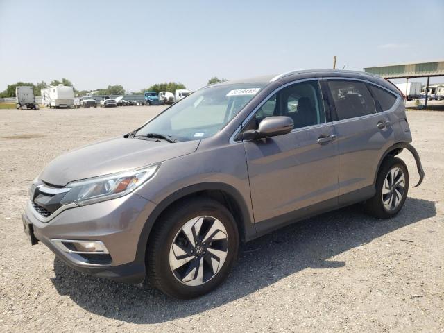 HONDA CR-V TOURI 2016 with VIN 5J6RM3H98GL015686 - Photo from auction
