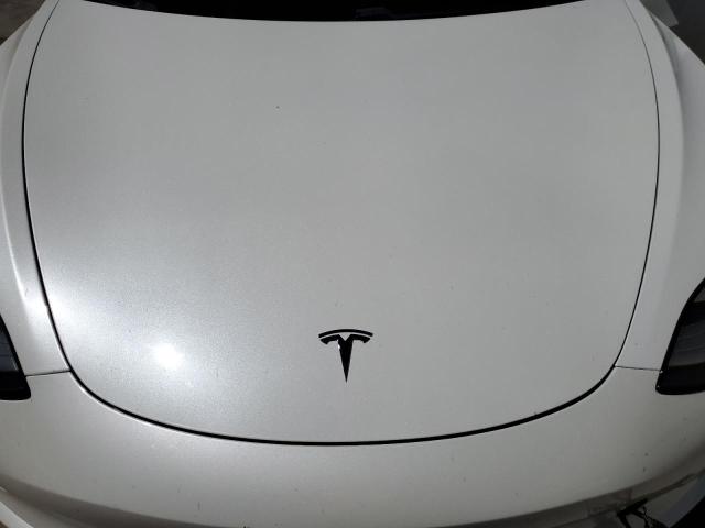 Photo 11 from auction – 2018 TESLA MODEL 3 with VIN 5YJ3E1EBXJF067612
