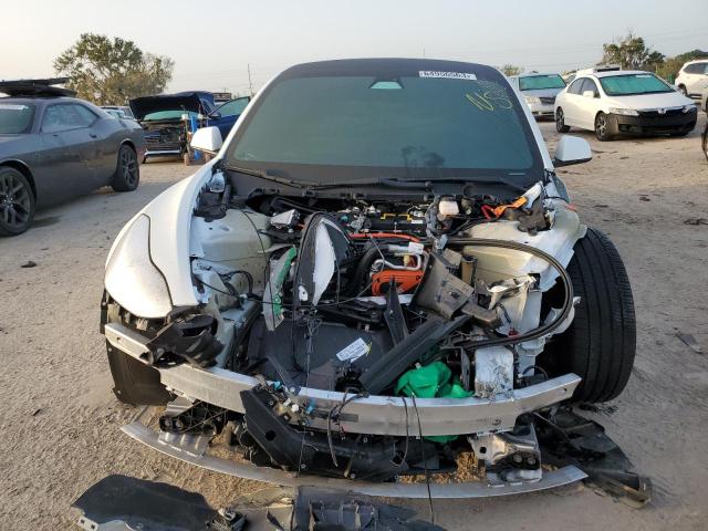 Photo 5 from auction – 2021 TESLA MODEL 3 with VIN 5YJ3E1EA5MF963652