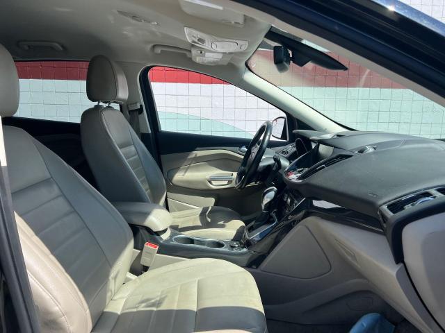 Photo 5 from auction – 2014 FORD ESCAPE TIT with VIN 1FMCU9J99EUA42522