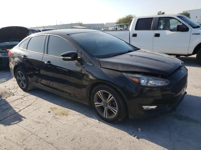 Photo 4 from auction – 2016 FORD FOCUS SE with VIN 1FADP3FE4GL306909