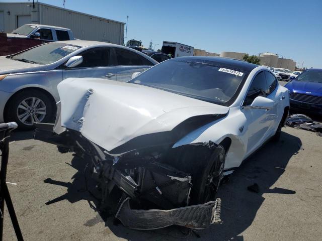 TESLA MODEL S 2015 with VIN 5YJSA1E21FF112080 - Photo from auction