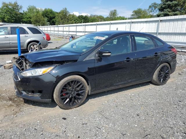 FORD FOCUS SE 2017 with VIN 1FADP3FE5HL220915 - Photo from auction