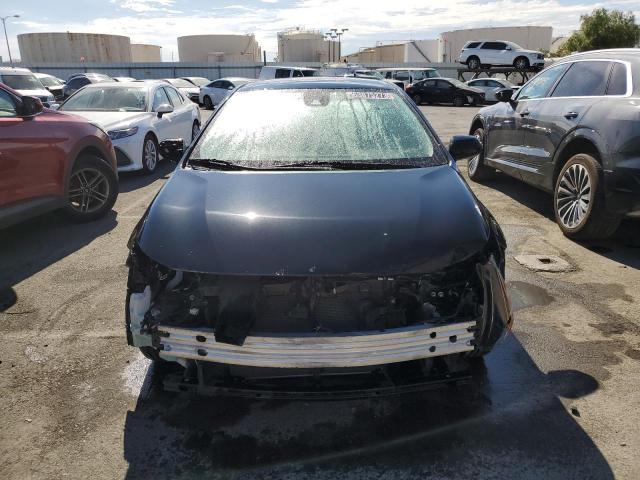 Photo 5 from auction – 2021 TOYOTA COROLLA LE with VIN 5YFEPMAE6MP239132