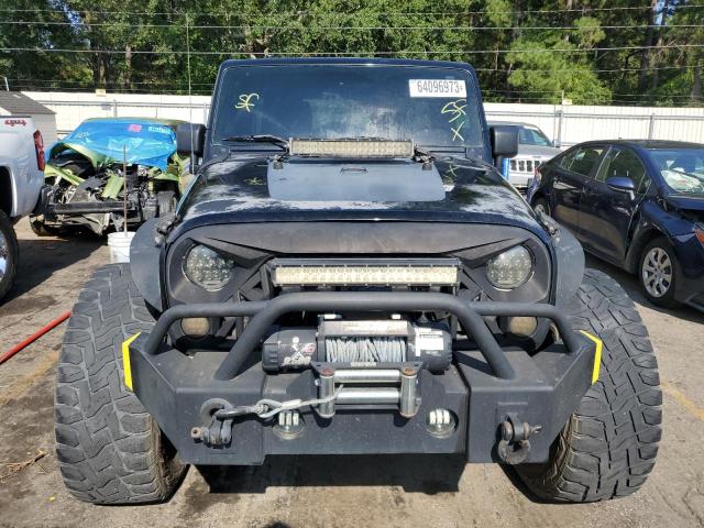 Photo 5 from auction – 2011 JEEP WRANGLER U with VIN 1J4BA6H16BL574068