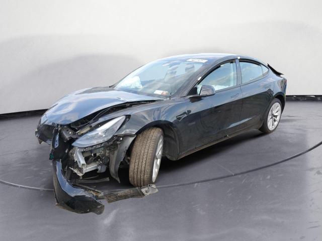 TESLA MODEL 3 2023 with VIN 5YJ3E1EAXPF451700 - Photo from auction