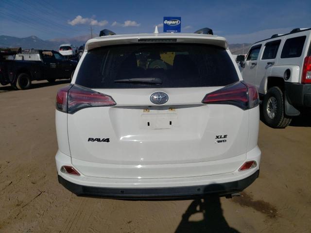 Photo 6 from auction – 2016 TOYOTA RAV4 XLE with VIN JTMRFREV9GJ062600