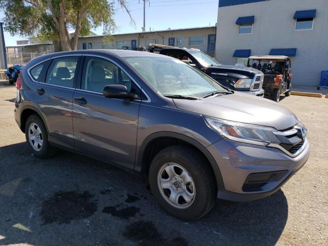 Photo 4 from auction – 2016 HONDA CR-V LX with VIN 2HKRM4H31GH670820