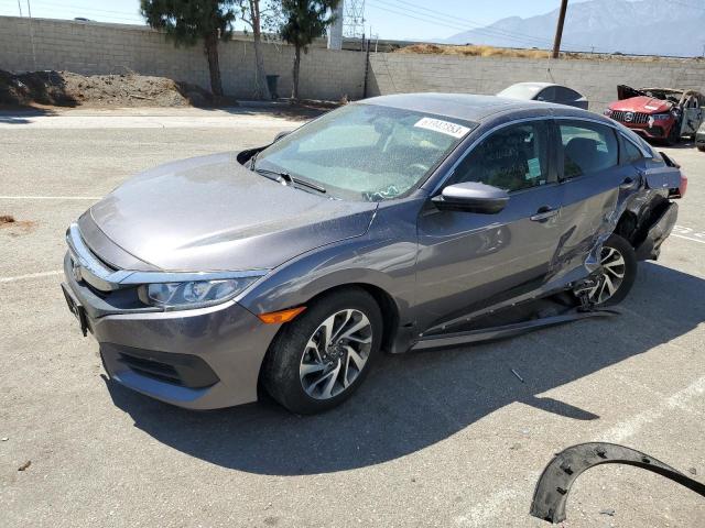 HONDA CIVIC EX 2018 with VIN 2HGFC2F73JH517213 - Photo from auction