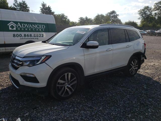 HONDA PILOT ELIT 2017 with VIN 5FNYF6H09HB097477 - Photo from auction