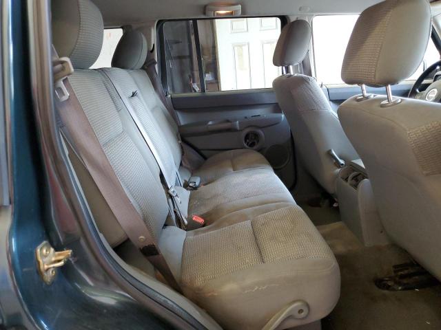 Photo 11 from auction – 2006 JEEP COMMANDER with VIN 1J8HH48KX6C136628