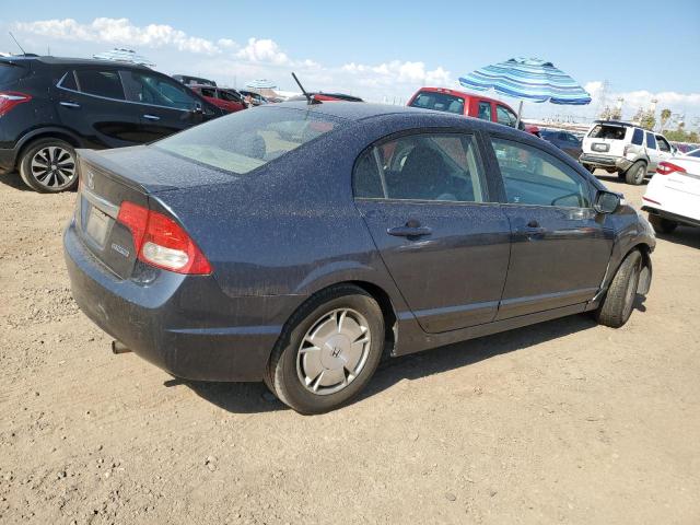 Photo 3 from auction – 2009 HONDA CIVIC HYBR with VIN JHMFA36219S009503