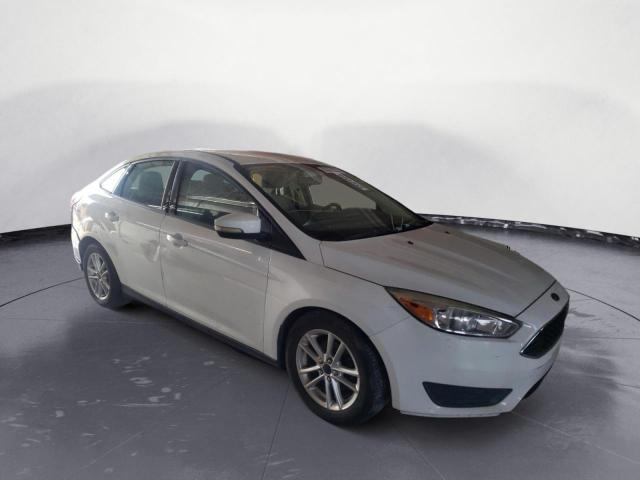 Photo 4 from auction – 2016 FORD FOCUS SE with VIN 1FADP3F27GL214019