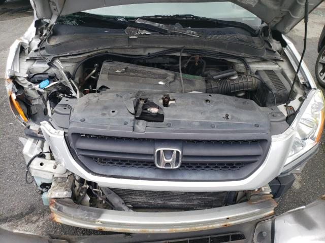 Photo 11 from auction – 2003 HONDA PILOT EX with VIN 2HKYF18453H583364