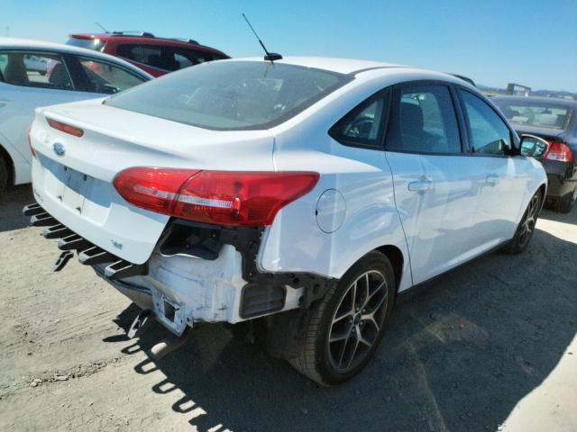 Photo 3 from auction – 2018 FORD FOCUS SEL with VIN 1FADP3H23JL304577