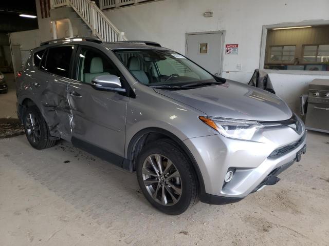 Photo 4 from auction – 2018 TOYOTA RAV4 LIMIT with VIN JTMDFREV3JD247970