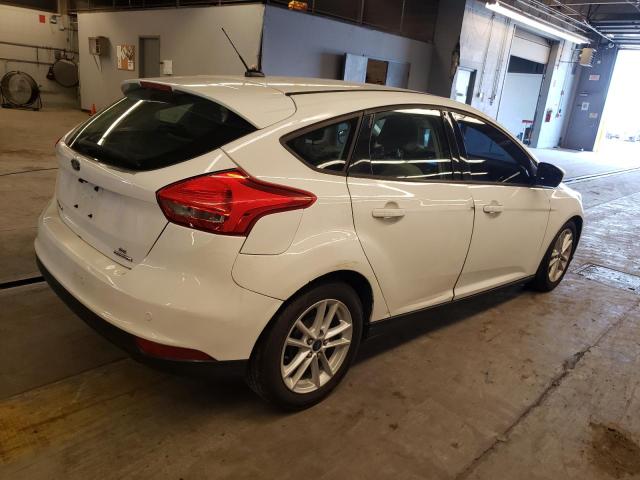 Photo 3 from auction – 2015 FORD FOCUS SE with VIN 1FADP3K22FL236272
