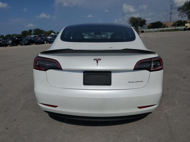 Снимка 6 от търг – 2022 TESLA MODEL 3 с VIN 5YJ3E1EB3NF184261