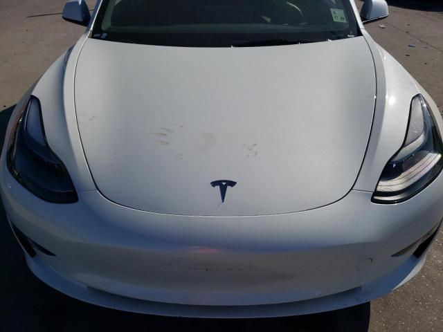 Photo 11 from auction – 2023 TESLA MODEL 3 with VIN 5YJ3E1EA9PF438355