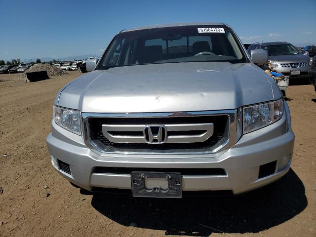 Photo 5 from auction – 2010 HONDA RIDGELINE with VIN 5FPYK1F47AB011472