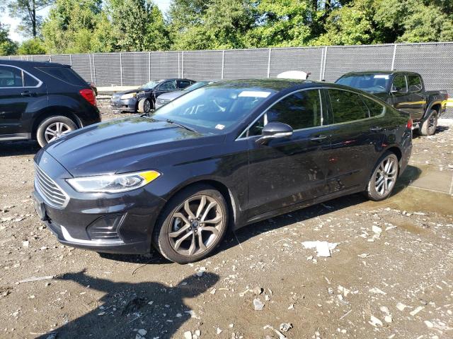 FORD FUSION SEL 2019 with VIN 3FA6P0CDXKR233641 - Photo from auction