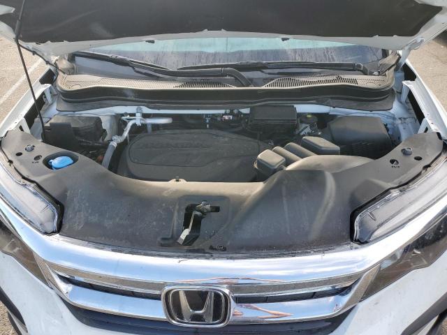 Photo 12 from auction – 2021 HONDA PILOT EX with VIN 5FNYF5H3XMB045578