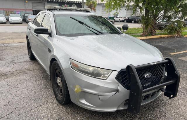 FORD TAURUS POL 2013 with VIN 1FAHP2L84DG157870 - Photo from auction