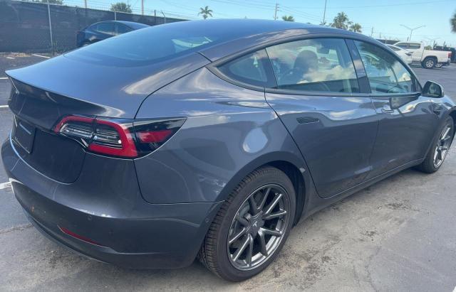 Photo 4 from auction – 2022 TESLA MODEL 3 with VIN 5YJ3E1EA7NF190006