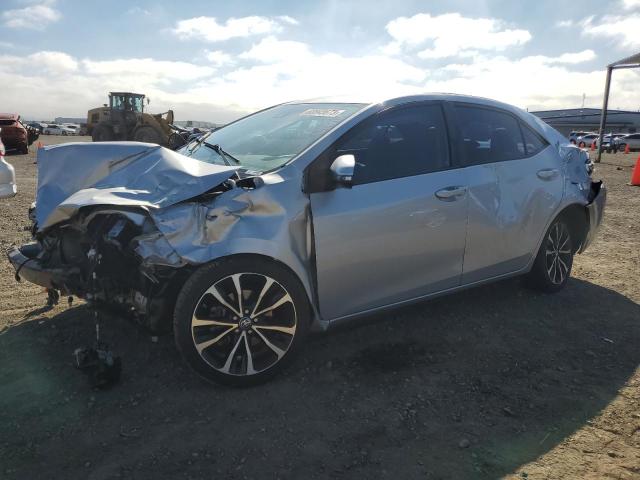 TOYOTA COROLLA L 2017 with VIN 5YFBURHE0HP712379 - Photo from auction