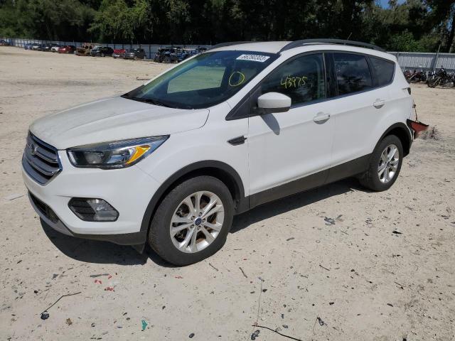 FORD ESCAPE SE 2018 with VIN 1FMCU9GD8JUB16518 - Photo from auction