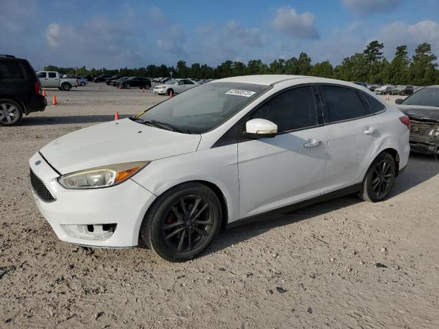 FORD FOCUS SE 2015 with VIN 1FADP3F29FL210357 - Photo from auction